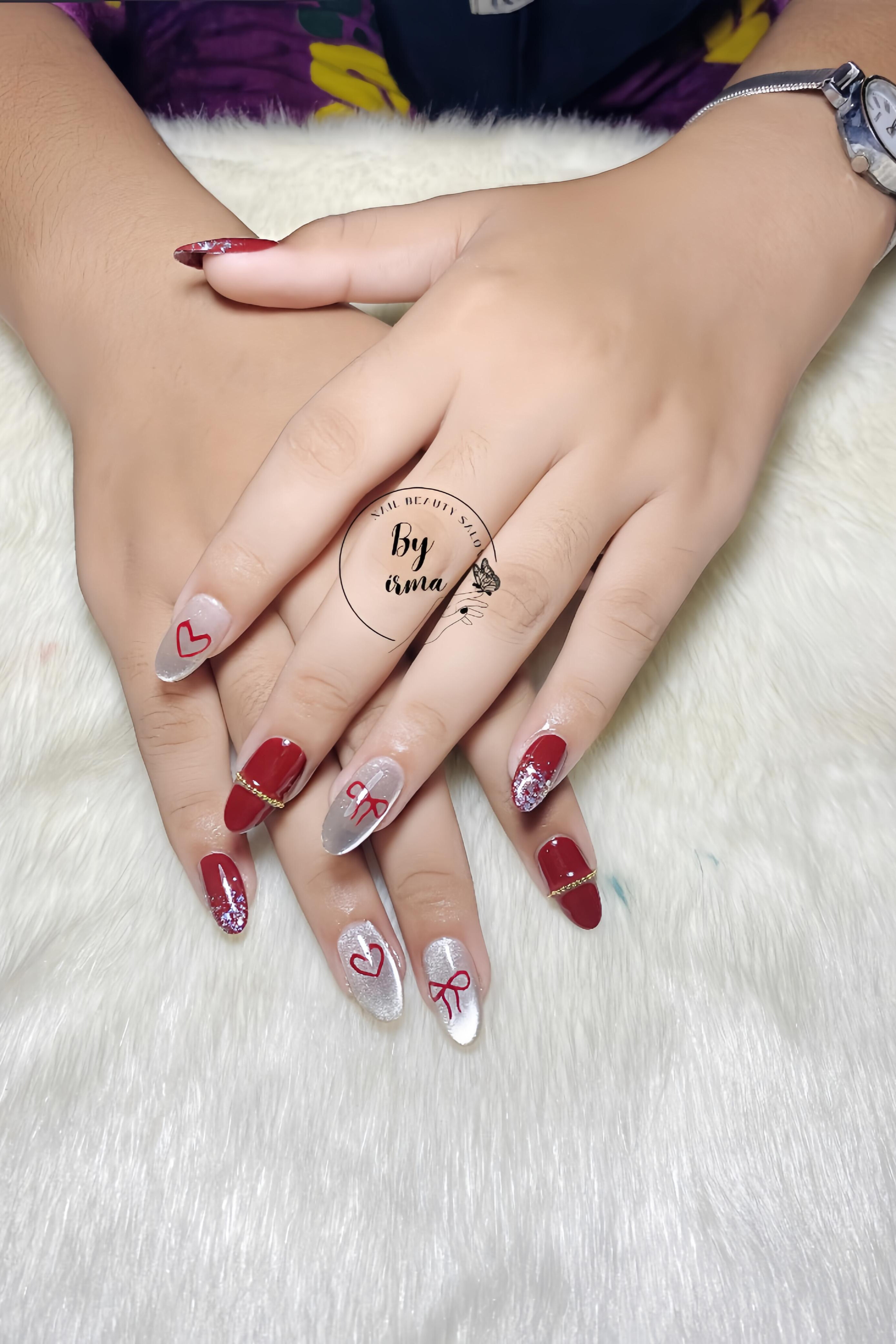 French manicure with gold leaf accents on natural nails
