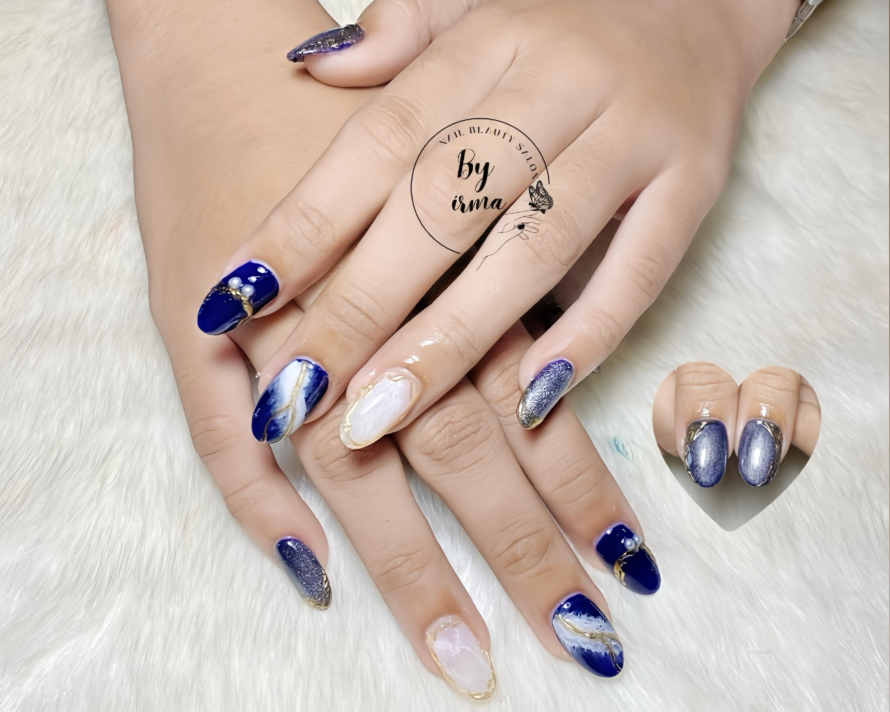 Glitter gradient nails transitioning from nude to holographic silver